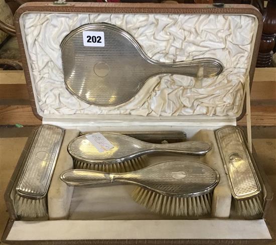 Set of silver toilet brushes etc